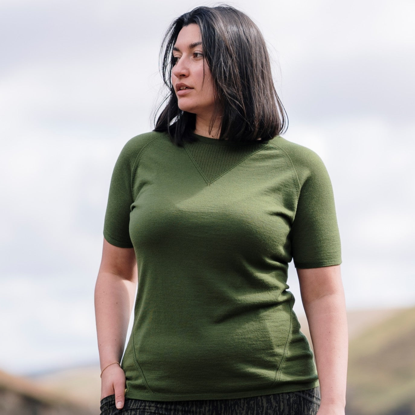 Women wearing Merino Route T Shirt in Moss Green