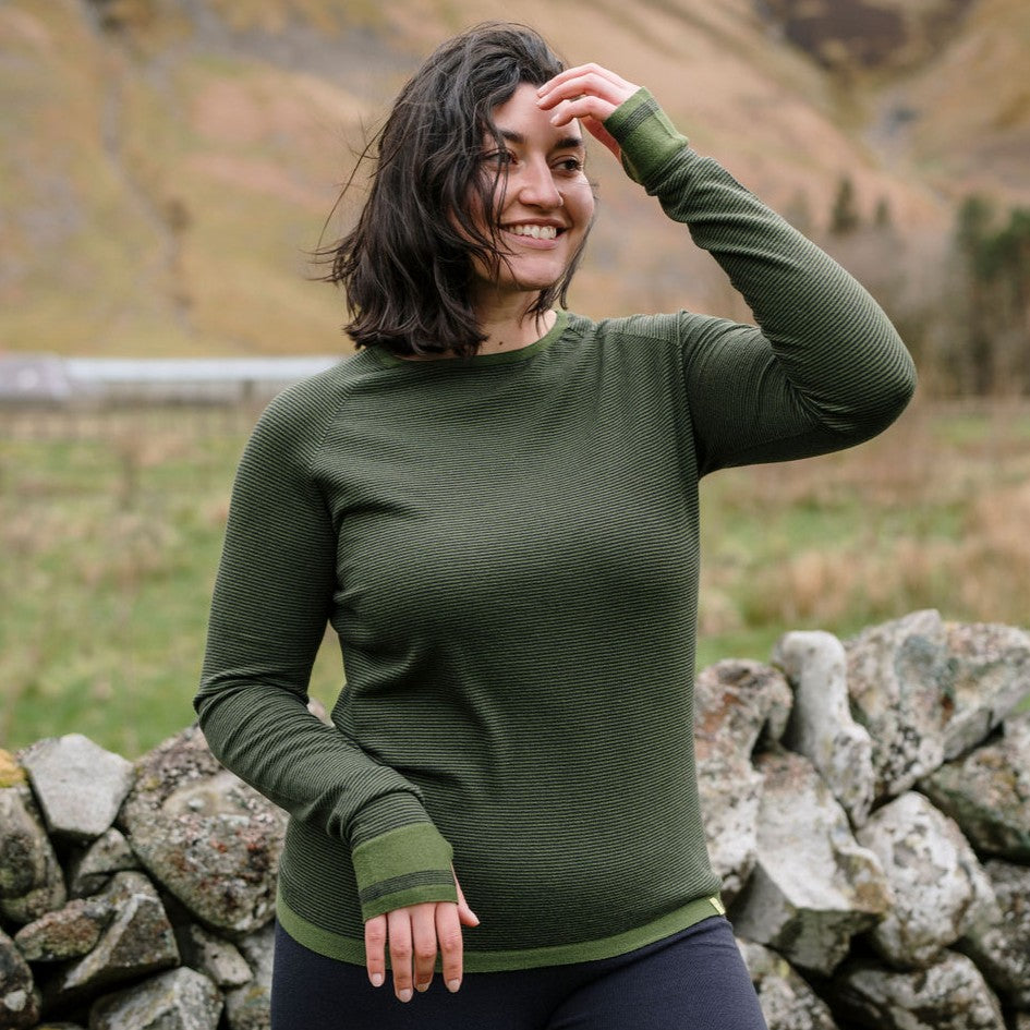 Woman wearing FINDRA merino base layers