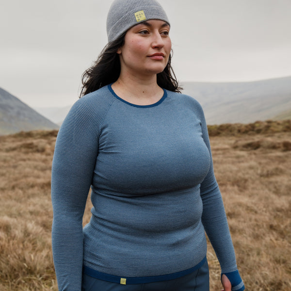 Woman wearing FINDRA merino base layers