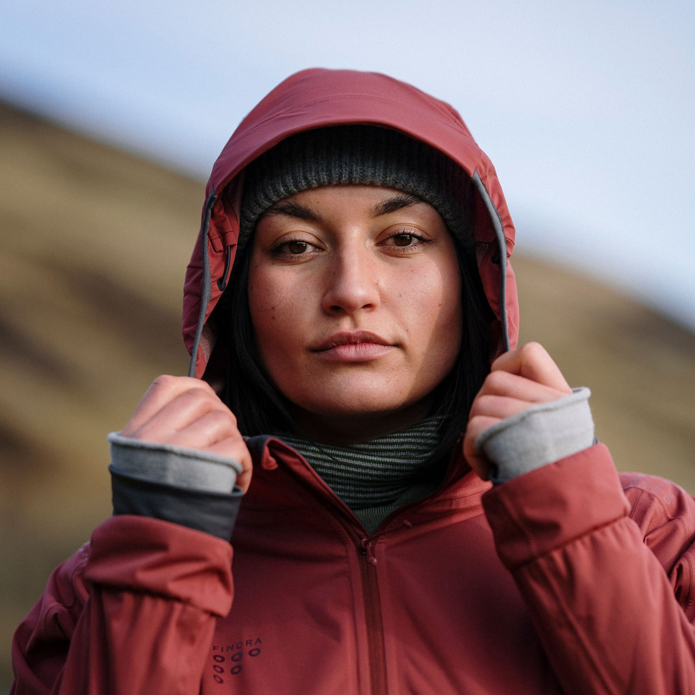 Woman wearing a jacket from the FINDRA technical outdoor clothing range
