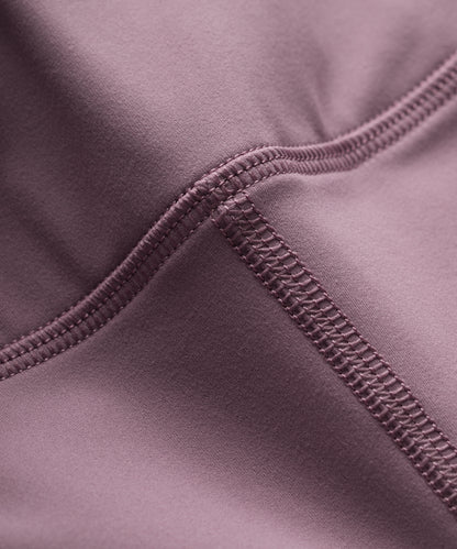 Close-up of a purple fabric with flat lock seam detail