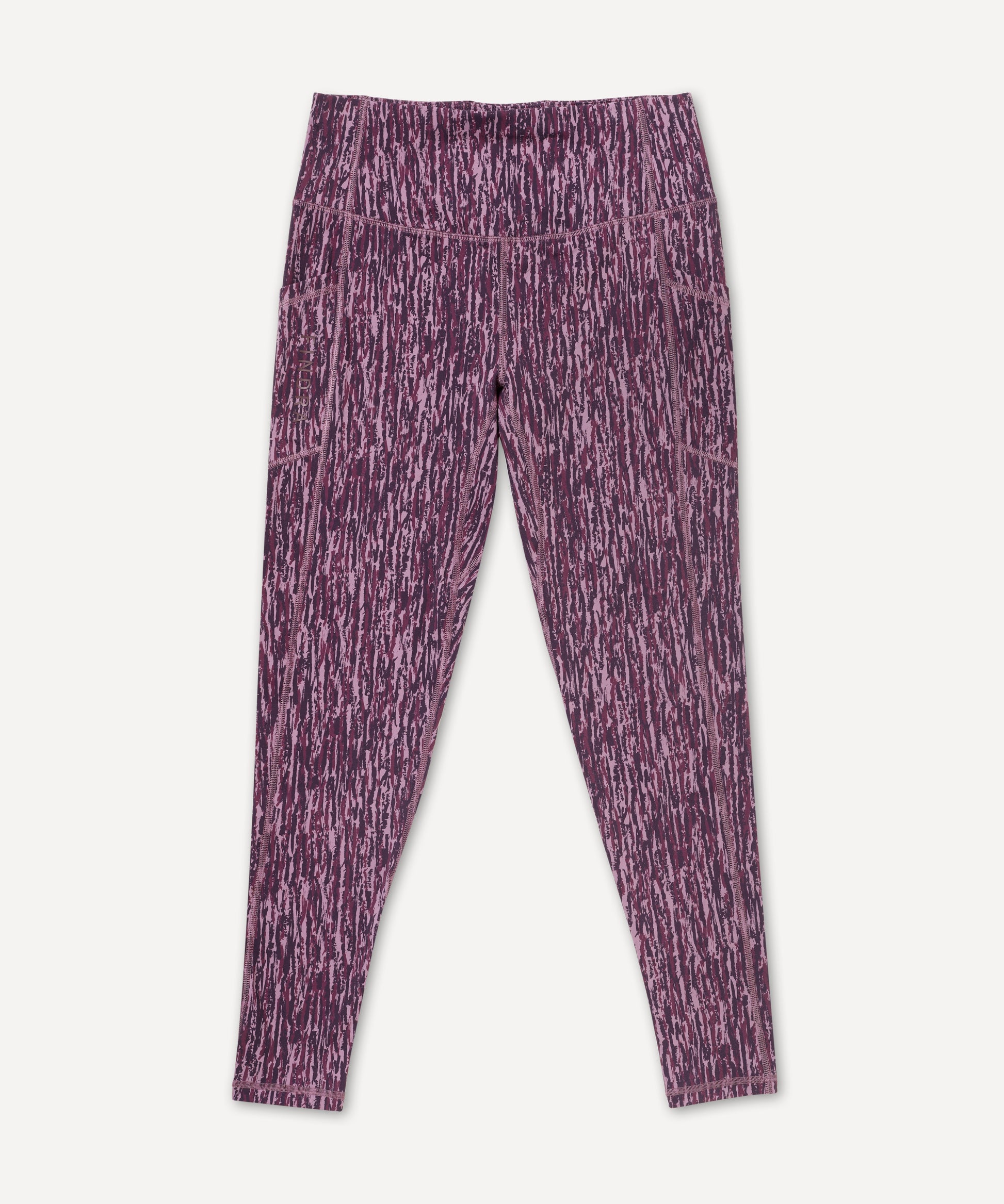 Purple patterned technical leggings on a white background