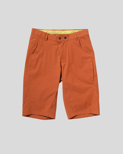 Orange shorts on a light gray background